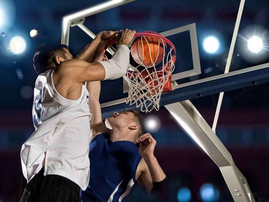 Basketball players playing